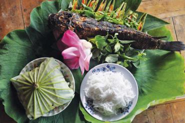 COME DONG THAP- ENJOY  GRILLED SNAKEHEAD FISH ROLLED IN YOUNG LOTUS LEAF
